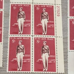 Stamp collection  1960s Amelia Earnheart Rare eight Cent Postage Stamps